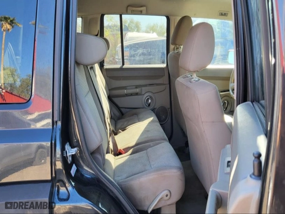 2010 Jeep Commander Sport with VIN 1J4RH4GK9AC147040, listed as a IAAI auction lot 41975670 with 89,213 mi miles. Bid and sale history available at carsss.com. Image 7.