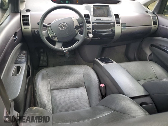 2005 Toyota Prius z VIN JTDKB20U553007615, wystawiony jako Copart lot #51169635 z przebiegiem 170 045 mil mil oraz Szkoda całkowita • Salvage title. Historia ofert i sprzedaży dostępna na DreamBid. Obrazek 8.