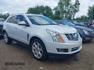 2014 Cadillac SRX Performance Collection with VIN 3GYFNCE35ES561742, listed as a IAAI auction lot 42579887 with 95,009 mi miles and . Bid and sale history available at DreamBid. Image 1.