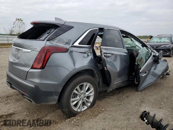 2021 Cadillac XT5 FWD Luxury with VIN 1GYKNAR44MZ192797, listed as a Copart auction lot 87304294 with 0 mi miles and Salvage Title. Bid and sale history available at carsss.com. Image 3.