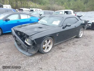 2013 Dodge Challenger R/T with VIN 2C3CDYBT7DH501545, listed as a IAAI auction lot 41705838 with 85,559 mi miles. Bid and sale history available at carsss.com. Image 2.