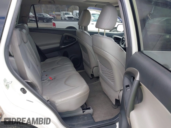 2010 Toyota RAV4 Limited with VIN JTMDF4DV3A5023063, listed as a IAAI auction lot 41983738 with 163,059 mi miles and . Bid and sale history available at DreamBid. Image 8.