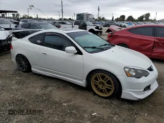 2002 Acura RSX Auto with VIN JH4DC548X2C034663, listed as a Copart auction lot 55980275 with 165,809 mi miles and Salvage title. Bid and sale history available at DreamBid. Image 4.