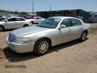 2006 Lincoln Town Car Signature z VIN 1LNHM81W86Y651116, wystawiony jako Copart lot #57908765 z przebiegiem 170 692 mil mil oraz Tytuł czysty. Historia ofert i sprzedaży dostępna na DreamBid. Obrazek 1.