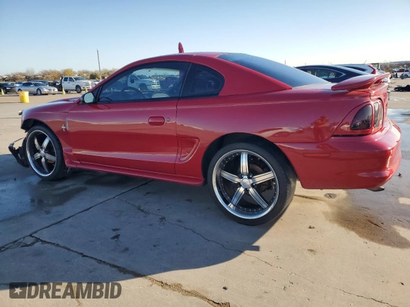1996 Ford Mustang with VIN 1FALP4041TF234741, listed as a Copart auction lot 85277894 with 113,353 mi miles and Salvage Title. Bid and sale history available at carsss.com. Image 2.