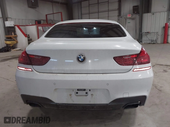 2014 BMW 6 Series 650i xDrive z VIN WBA6B4C55ED371378, wystawiony jako IAAI lot #41640888 z przebiegiem 80 927 mil mil oraz . Historia ofert i sprzedaży dostępna na DreamBid. Obrazek 16.