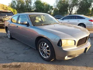 2006 Dodge Charger R/T with VIN 2B3KA53H26H361580, listed as a IAAI auction lot 40874293 with 239,930 mi miles. Bid and sale history available at carsss.com. Image 1.