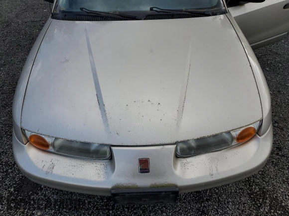 2001 Saturn SL z VIN 1G8ZG52851Z213567, wystawiony jako Copart lot #51795795 z przebiegiem Nie podano mil oraz Szkoda całkowita • Salvage title. Historia ofert i sprzedaży dostępna na DreamBid. Obrazek 11.