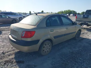 2007 Kia Rio LX with VIN KNADE123176203130, listed as a IAAI auction lot 41982135 with 221,702 mi miles. Bid and sale history available at carsss.com. Image 4.