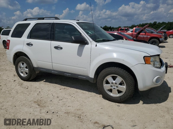 2012 Ford Escape XLT с VIN 1FMCU0DGXCKA23430, выставлен на аукционе Copart как лот 59546645 с пробегом 128 369 миль миль и Списание • Salvage title. История ставок и продаж доступна на DreamBid. Изображение 4.