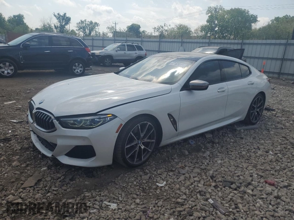 2020 BMW 8 Series M850i z VIN WBAGV8C06LBP48932, wystawiony jako Copart lot #57165015 z przebiegiem 55 731 mil mil oraz Szkoda całkowita • Salvage title. Historia ofert i sprzedaży dostępna na DreamBid. Obrazek 1.
