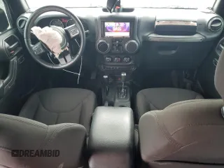 2018 Jeep Wrangler Unlimited Sport S with VIN 1C4BJWDG0JL818800, listed as a Copart auction lot 56648505 with 114,011 mi miles and Salvage Title. Bid and sale history available at DreamBid. Image 8.