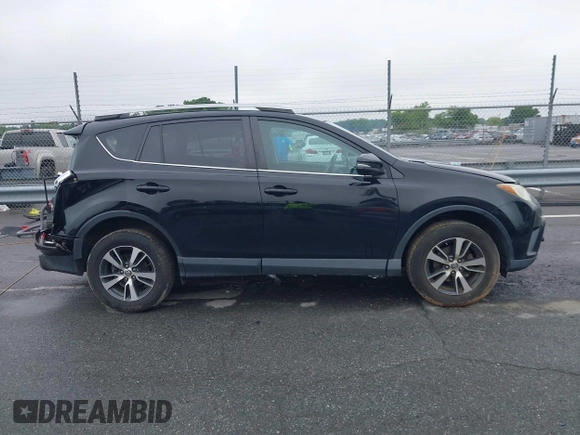 2018 Toyota RAV4 XLE with VIN 2T3WFREVXJW501296, listed as a IAAI auction lot 42358130 with 163,669 mi miles and . Bid and sale history available at DreamBid. Image 14.