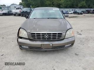 2000 Cadillac DeVille DTS z VIN 1G6KF5794YU249059, wystawiony jako Copart lot #71614494 z przebiegiem 121 611 mil mil oraz Szkoda całkowita • Salvage title. Historia ofert i sprzedaży dostępna na DreamBid. Obrazek 5.