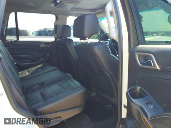2015 GMC Yukon Denali with VIN 1GKS1CKJ8FR575730, listed as a IAAI auction lot 42048050 with 113,077 mi miles. Bid and sale history available at carsss.com. Image 8.