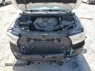 2015 Dodge Durango SXT z VIN 1C4RDHAG0FC147402, wystawiony jako Copart lot #61728915 z przebiegiem 107 104 mil mil oraz Szkoda całkowita • Salvage title. Historia ofert i sprzedaży dostępna na DreamBid. Obrazek 12.