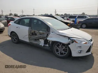 2014 Ford Focus SE with VIN 1FADP3F22EL110454, listed as a Copart auction lot 70076854 with 98,577 mi miles and Salvage Title. Bid and sale history available at carsss.com. Image 4.