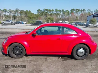 2012 Volkswagen Beetle 2.5L PZEV with VIN 3VWJP7AT0CM649068, listed as a IAAI auction lot 41684217 with 135,829 mi miles. Bid and sale history available at carsss.com. Image 14.