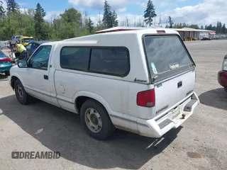 1997 GMC Sonoma z VIN 1GTCS1443VK511286, wystawiony jako IAAI lot #42236026 z przebiegiem 154 768 mil mil oraz . Historia ofert i sprzedaży dostępna na DreamBid. Obrazek 3.
