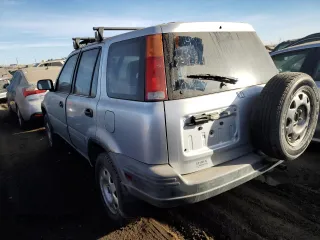 2000 Honda CR-V LX with VIN JHLRD1740YC054163, listed as a Copart auction lot 85508334 with 197,470 mi miles and Salvage Title. Bid and sale history available at carsss.com. Image 2.