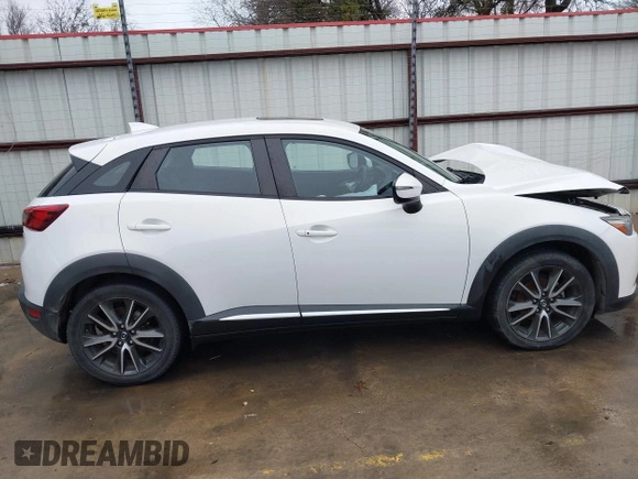2016 Mazda CX-3 Grand Touring with VIN JM1DKBD73G0124742, listed as a IAAI auction lot 41448684 with 96,322 mi miles. Bid and sale history available at carsss.com. Image 13.