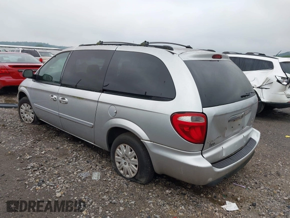2005 Chrysler Town & Country LX with VIN 2C4GP44R35R152152, listed as a IAAI auction lot 42190551 with 128,239 mi miles and . Bid and sale history available at DreamBid. Image 3.