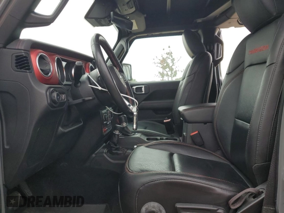 2019 Jeep Wrangler Unlimited Rubicon with VIN 1C4HJXFG6KW661609, listed as a Copart auction lot 55527005 with 25,302 mi miles and Salvage title. Bid and sale history available at DreamBid. Image 7.