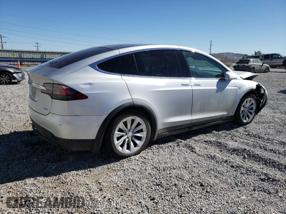 2016 Tesla Model X 70D with VIN 5YJXCAE29GF004033, listed as a Copart auction lot 49673975 with 220,259 mi miles and Salvage Title. Bid and sale history available at DreamBid. Image 3.