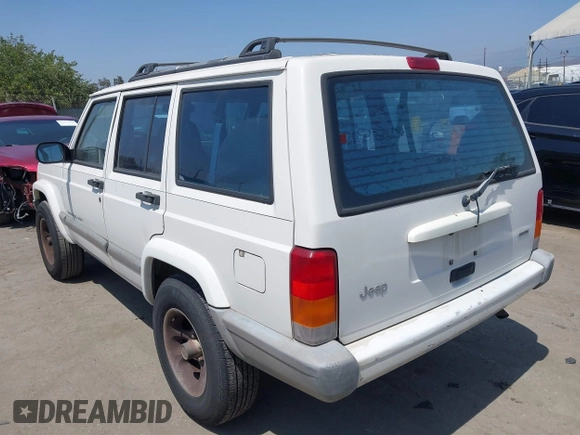 2000 Jeep Cherokee z VIN 1J4FT48S8YL214074, wystawiony jako IAAI lot #42577235 z przebiegiem 287 868 mil mil oraz . Historia ofert i sprzedaży dostępna na DreamBid. Obrazek 3.