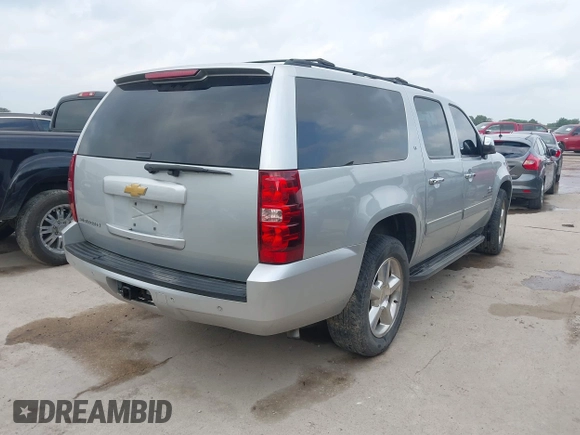2013 Chevrolet Suburban LT with VIN 1GNSCJE03DR164477, listed as a IAAI auction lot 42083985 with 150,540 mi miles and . Bid and sale history available at DreamBid. Image 4.