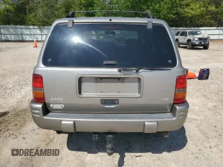 1998 Jeep Grand Cherokee Limited with VIN 1J4GZ78YXWC160346, listed as a Copart auction lot 52595655 with Not provided miles and Salvage title. Bid and sale history available at DreamBid. Image 6.