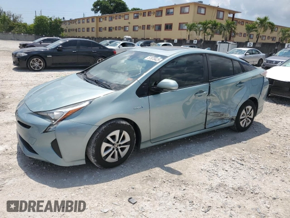 2017 Toyota Prius Two z VIN JTDKARFUXH3040343, wystawiony jako Copart lot #57870425 z przebiegiem 59 711 mil mil oraz Szkoda całkowita • Salvage title. Historia ofert i sprzedaży dostępna na DreamBid. Obrazek 1.