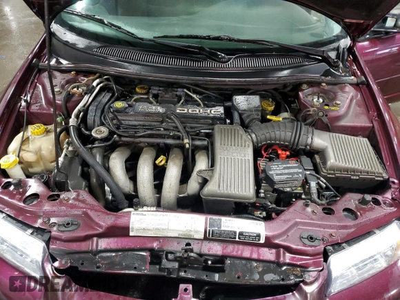 1999 Dodge Stratus z VIN 1B3EJ46X4XN676917, wystawiony jako Copart lot #85511864 z przebiegiem 135 783 mil mil oraz Szkoda całkowita • Salvage title. Historia ofert i sprzedaży dostępna na DreamBid. Obrazek 11.