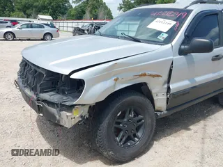 2002 Jeep Grand Cherokee Laredo with VIN 1J4GX48S32C288387, listed as a IAAI auction lot 42212249 with 151,028 mi miles and . Bid and sale history available at DreamBid. Image 6.