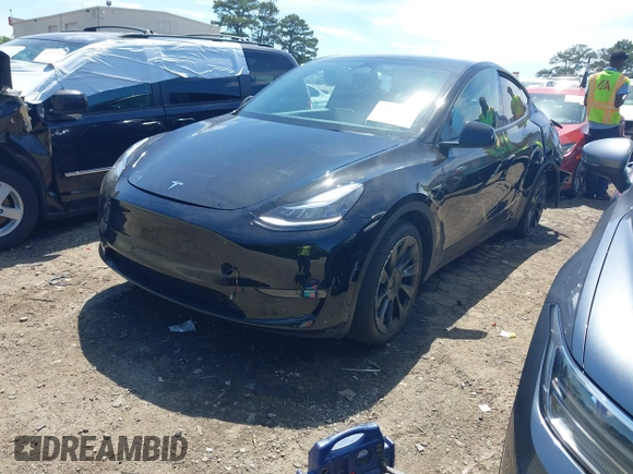 2022 Tesla Model Y Long Range z VIN 7SAYGDEE4NA006645, wystawiony jako IAAI lot #42192495 z przebiegiem 28 784 mil mil oraz . Historia ofert i sprzedaży dostępna na DreamBid. Obrazek 20.
