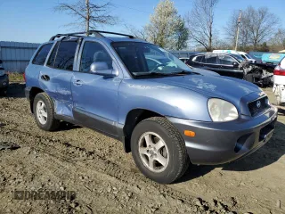2002 Hyundai Santa Fe GLS with VIN KM8SC13D72U229643, listed as a Copart auction lot 52303635 with 71,912 mi miles and Salvage Title. Bid and sale history available at carsss.com. Image 4.