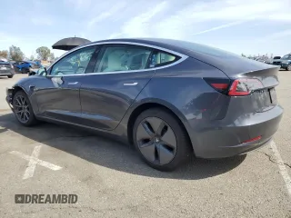 2019 Tesla Model 3 Mid Range with VIN 5YJ3E1EA0KF445185, listed as a Copart auction lot 48630675 with 76,351 mi miles and Salvage Title. Bid and sale history available at carsss.com. Image 2.