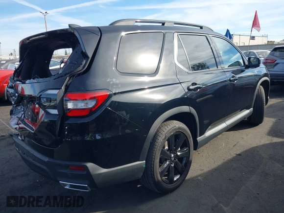 2025 Honda Pilot Black Edition with VIN 5FNYG1H99SB017956, listed as a IAAI auction lot 41401879 with 5,385 mi miles. Bid and sale history available at carsss.com. Image 4.