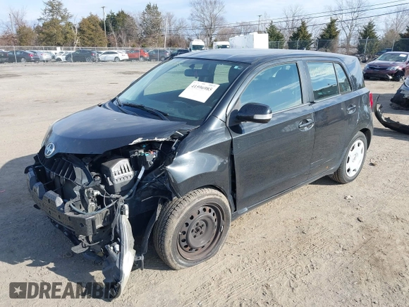 2010 Scion xD with VIN JTKKU4B43AJ055535, listed as a IAAI auction lot 41596985 with 200,000 mi miles. Bid and sale history available at carsss.com. Image 17.