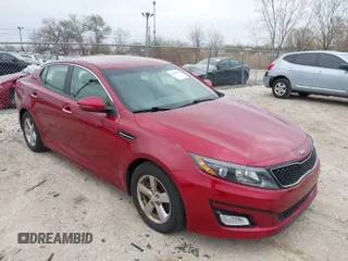 2015 Kia Optima LX with VIN 5XXGM4A72FG357449, listed as a IAAI auction lot 42079075 with 136,042 mi miles. Bid and sale history available at carsss.com. Image 1.