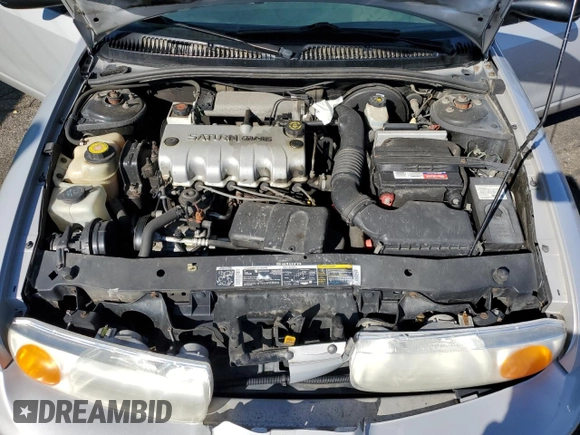 2001 Saturn SL z VIN 1G8ZH52891Z317279, wystawiony jako Copart lot #55163885 z przebiegiem 136 029 mil mil oraz Nie do naprawy • Non repairable. Historia ofert i sprzedaży dostępna na DreamBid. Obrazek 11.