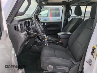 2023 Jeep Wrangler Sport S with VIN 1C4HJXDN5PW678653, listed as a Copart auction lot 57464705 with 22,154 mi miles and Salvage title. Bid and sale history available at DreamBid. Image 7.