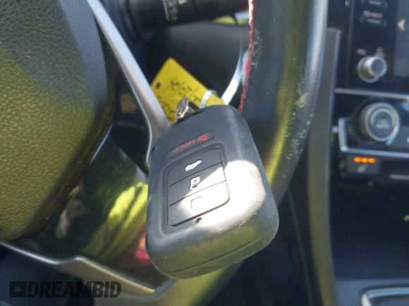 2020 Honda Civic Si with VIN 2HGFC1E54LH704828, listed as a IAAI auction lot 41300541 with 89,992 mi miles and . Bid and sale history available at DreamBid. Image 11.