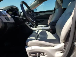 2016 Cadillac SRX Luxury Collection with VIN 3GYFNBE37GS556832, listed as a Copart auction lot 71701164 with 118,871 mi miles and Salvage title. Bid and sale history available at DreamBid. Image 7.