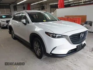2017 Mazda CX-9 Sport z VIN JM3TCBBY4H0143619, wystawiony jako IAAI lot #39418276 z przebiegiem 198 141 mil mil oraz . Historia ofert i sprzedaży dostępna na DreamBid. Obrazek 1.