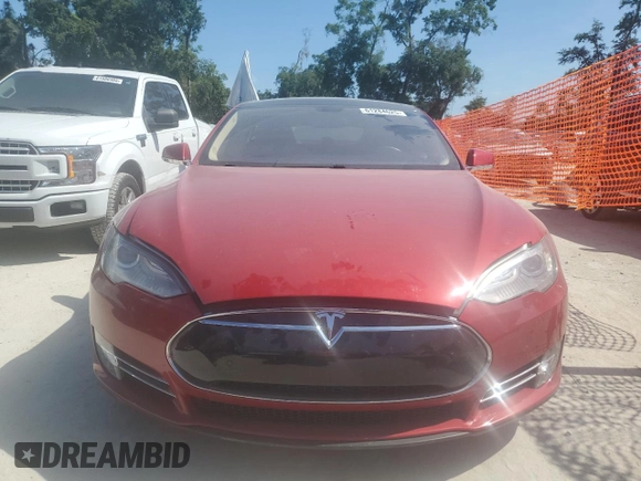 2014 Tesla Model S 60 z VIN 5YJSA1H19EFP27946, wystawiony jako Copart lot #61284625 z przebiegiem 109 147 mil mil oraz Szkoda całkowita • Salvage title. Historia ofert i sprzedaży dostępna na DreamBid. Obrazek 5.