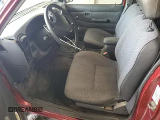 1996 Nissan Frontier XE with VIN 1N6SD16Y7TC354484, listed as a Copart auction lot 59773485 with 109,656 mi miles and Salvage title. Bid and sale history available at DreamBid. Image 7.