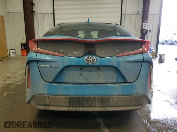 2021 Toyota Prius LE with VIN JTDKAMFP7M3186254, listed as a Copart auction lot 50225635 with 69,882 mi miles and Salvage Title. Bid and sale history available at DreamBid. Image 6.