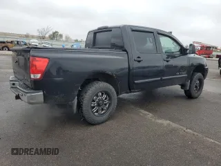 2014 Nissan Titan Pro-4X with VIN 1N6AA0EC3EN514744, listed as a Copart auction lot 80469314 with 191,780 mi miles and Salvage title. Bid and sale history available at DreamBid. Image 3.