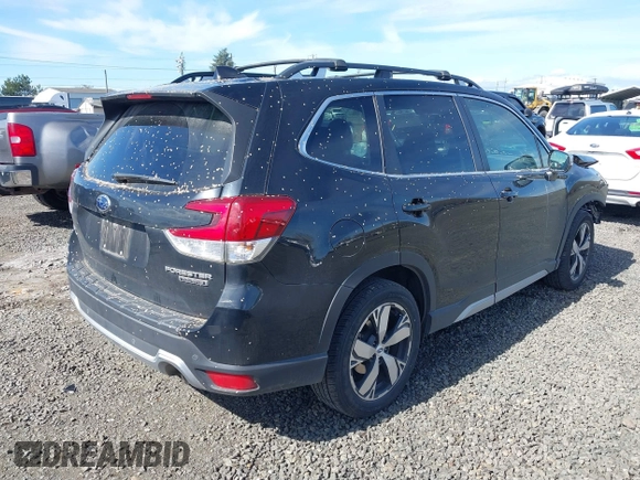 2021 Subaru Forester Touring with VIN JF2SKAXCXMH434072, listed as a IAAI auction lot 41857293 with 59,474 mi miles. Bid and sale history available at carsss.com. Image 4.